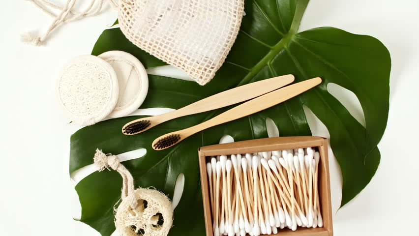 Natural skin care products. Zero waste, eco friendly bathroom and spa accessories. Personal care supplies: wooden comb, brush, toothbrush, soap in handmade. Beauty SPA branding mockup.