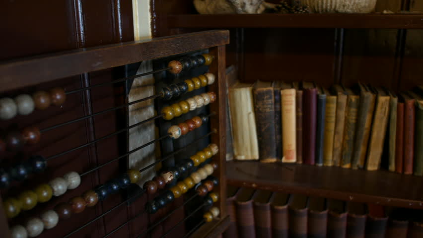 Abacus and old books in victorian school classroom Royalty-Free Stock Footage #1104994275