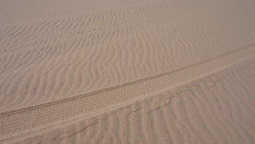 Pan on the Namib Desert dunes in the Skeleton Coast near Sandwich Harbour in Namibia, Africa. Royalty-Free Stock Footage #1105002805