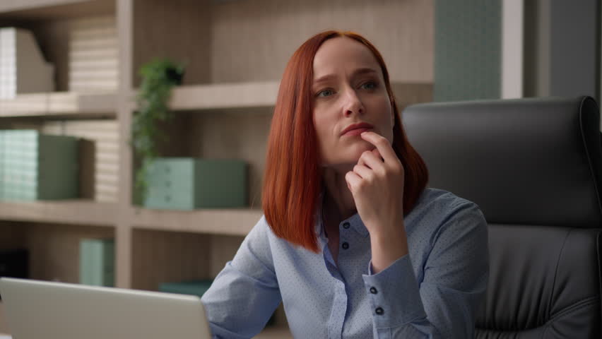 Thinking Caucasian businesswoman deep thoughts female office worker entrepreneur employer girl pensive woman think business decision problem solution create come up with idea find answer typing laptop Royalty-Free Stock Footage #1105014177