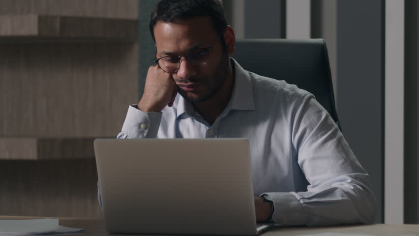Tired lazy napping yawn adult Indian man Arabian business male American manager office worker bored computer work online evening deadline businessman fatigued no energy overworked exhaustion yawning Royalty-Free Stock Footage #1105014179