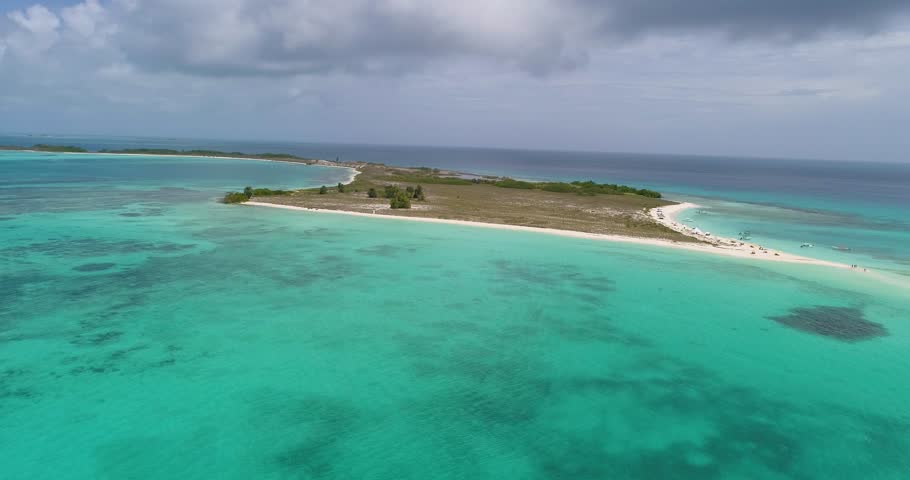  Tropical island with sandbank, CAYO DE AGUA Los Roques RAINY DAY , AERIAL SHOT PAN RIGHIT