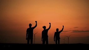 Fruends Successful Happy Travel Man Standing Top Joy and Raises Hands Silhouette Man Looking at View Sunset Sky Behind Mountains. Adventure Traveling Hike Man Hands Raised on Hill, slow motion - Powered by Shutterstock - Get 15% off with code: PIKWIZARD15