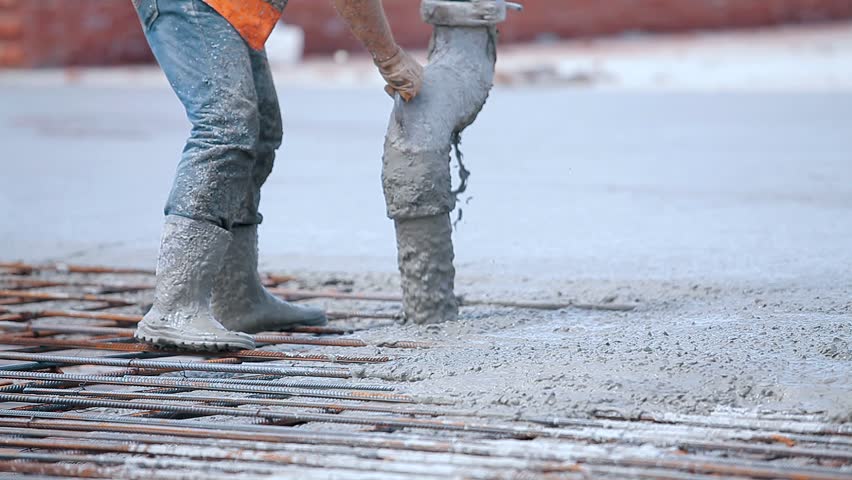 Pouring concrete for a metal structure. Reinforced concrete. Workers make a reinforced concrete structure. Royalty-Free Stock Footage #1105024129