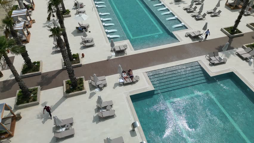 Located in Durrës - Albania, 27 miles from Skanderbeg Square, Meliá Durrës Albania has accommodations with an outdoor big swimming pool. Royalty-Free Stock Footage #1105024253