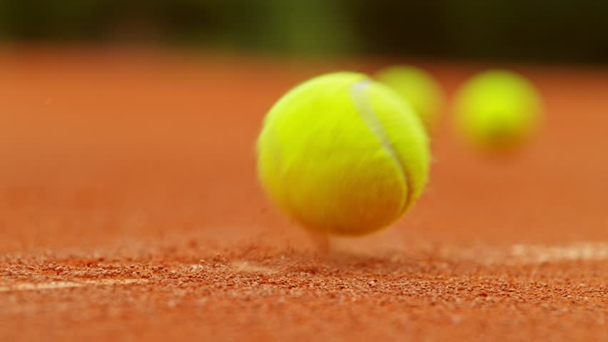 Super Slow Motion of Hitting Tennis Ball on Line. Low Depth of Focus. Filmed on High Speed Cinema Camera, 1000fps.