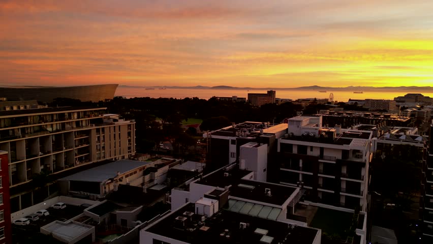 Witness the inspiring beauty of a sunrise over Cape Town, South Africa. With its expansive skyline and many natural wonders, the rising sun creates a breathtaking view that will leave you in awe. From
