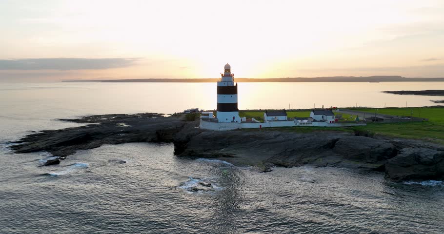 The oldest lighthouse in the world against a sunset backdrop. Hook Lighthouse