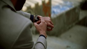 Man Using Smart Watch Wearable Wristband Device. Male Checking Pulse Smartwatch App. Businessman Scrolling On Display On Smartwatch Notification. Touch Screen Wearable Technology Smart Band On Wrist  - Powered by Shutterstock - Get 15% off with code: PIKWIZARD15