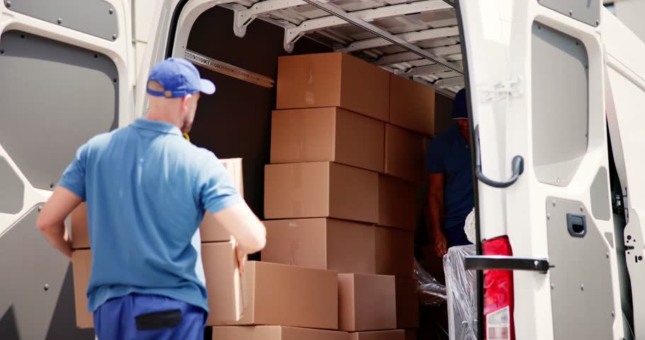 Truck Movers Loading Van Carrying Boxes And Moving House Royalty-Free Stock Footage #1105046539