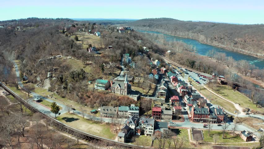 Aerial over the Harpers Ferry National Historical Park and Shenandoah River in Jefferson County, West Virginia, USA. Drone orbit shot