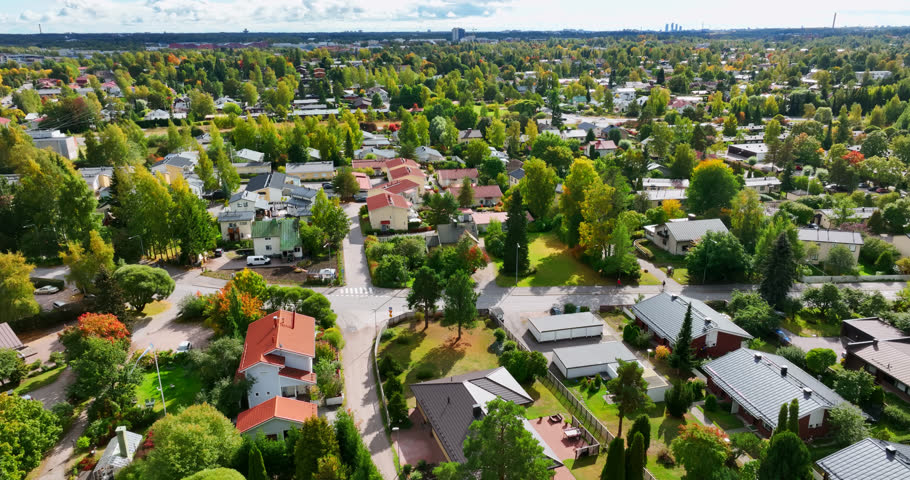 Aerial view overlooking a residential area, sunny, fall day in Northwest Helsinki, Finland Royalty-Free Stock Footage #1105051973