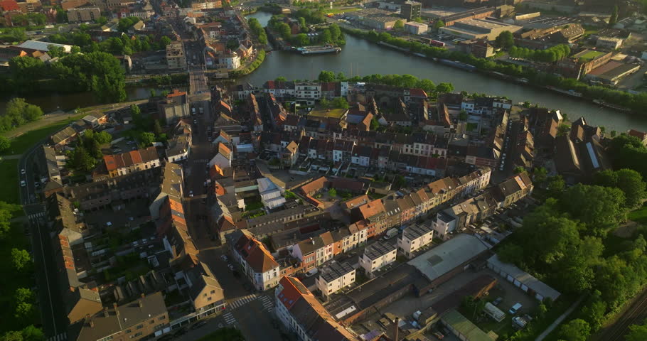 Aerial view of famous places Ghent, East Flanders province, Flemish Region of Belgium. The historic city center in the evening. Ghent aerial Cityscape. Gent Flanders Belgium on Sunny Day. Drone View