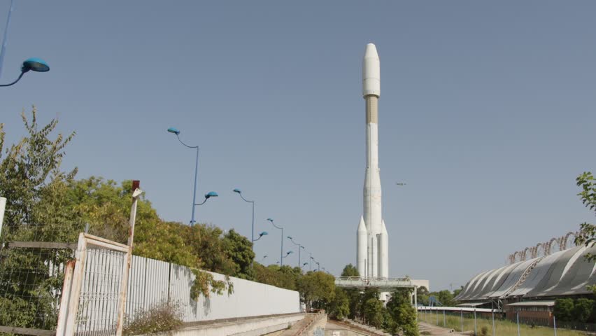 A prominent monument from the Seville International Exposition in 1992. On the ground, you can see a striking space rocket