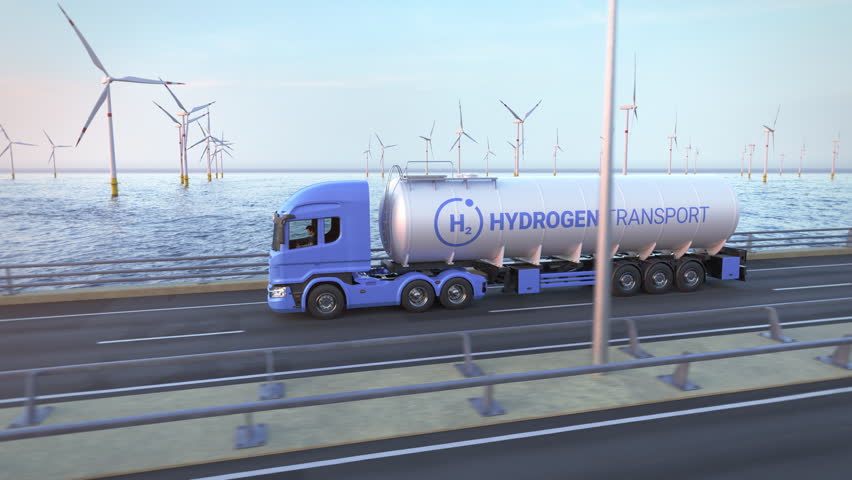 Generic electric semi truck with hydrogen tank trailer driving along a bridge or coastal road into the sunset with wind turbines in background. Green energy concept. Realistic 3d rendering animation.