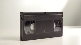 A black old VHS cassette with family recordings