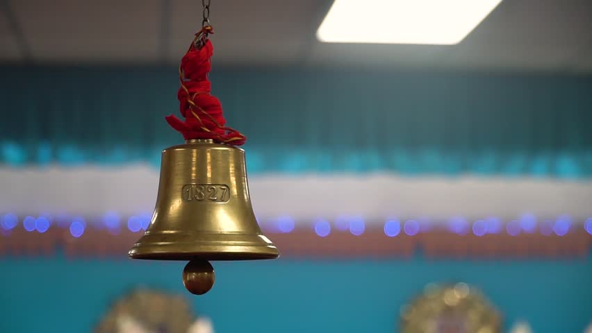 Divine Rhythm: Intricate Details of Ghenti Bells during a Sacred Hindu Temple Havan
