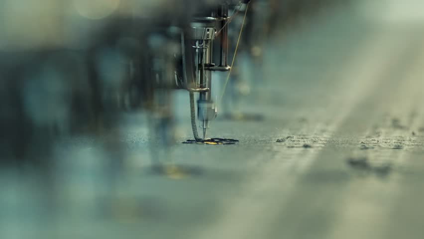 computerized production and embroidery machines in textile industry. textile factory tour showcasing cutting-edge machinery and craftsmanship Royalty-Free Stock Footage #1105071405
