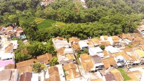 Aerial Footage. Tilt shot Landscape view of a residential district in a village in Bandung, Indonesia