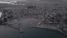 Aerial video over the marina in Piraeus in the evening