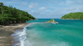 Aerial view Drone camera top down of seashore rocks in ocean, Beautiful sea surface, Amazing sea waves crashing on rocks seascape in Phuket island Thailand, Aerial view drone 4k High quality footage