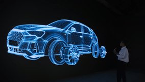 High-tech startup concept: An innovative female software engineer stands, conducting data analysis on a wall screen, showing the latest development in auto and robotics. Development of a futuristic - Powered by Shutterstock - Get 15% off with code: PIKWIZARD15