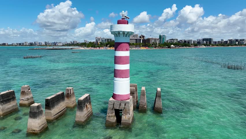 Ponta Verde Lighthouse At Maceio Alagoas Brazil. Seascape Shoreline. Shore Beach Sea. Shore Outdoors Beach City High Angle View. Shore Sea Ocean Bay. Maceio Alagoas. Lighthouse at Maceio Alagoas. Royalty-Free Stock Footage #1105096207