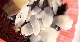 4K footage vertical video Front view SLO MO CU, Pouring sauce Chocolate Brownies ingredients for Make a dessert.