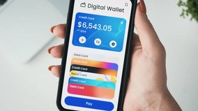 Paying with a credit card using digital wallet on the smartphone. Choosing from different credit cards for contactless payment. - Powered by Shutterstock - Get 15% off with code: PIKWIZARD15