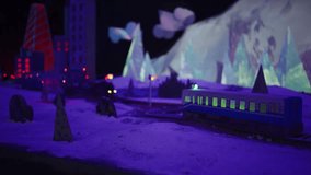futuristic neon toy railway or railroad for children, purple light illuminated - Powered by Shutterstock - Get 15% off with code: PIKWIZARD15