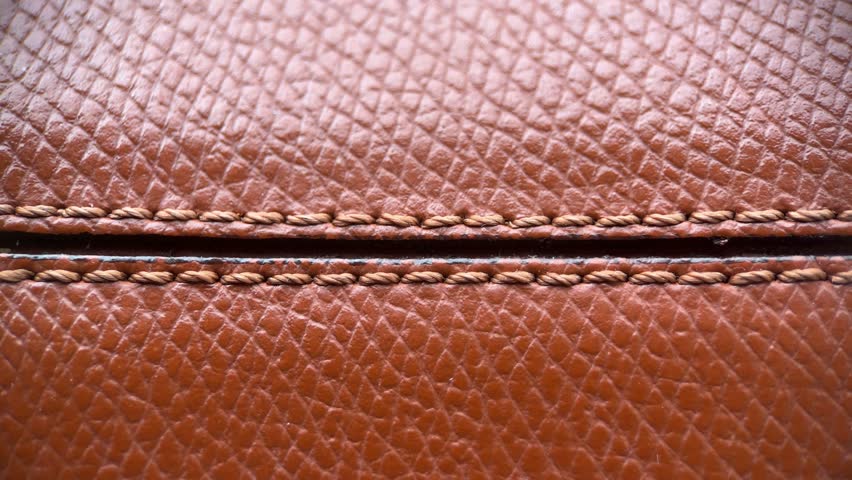 Macro Seam On Brown Leather Bags Royalty-Free Stock Footage #1105124833