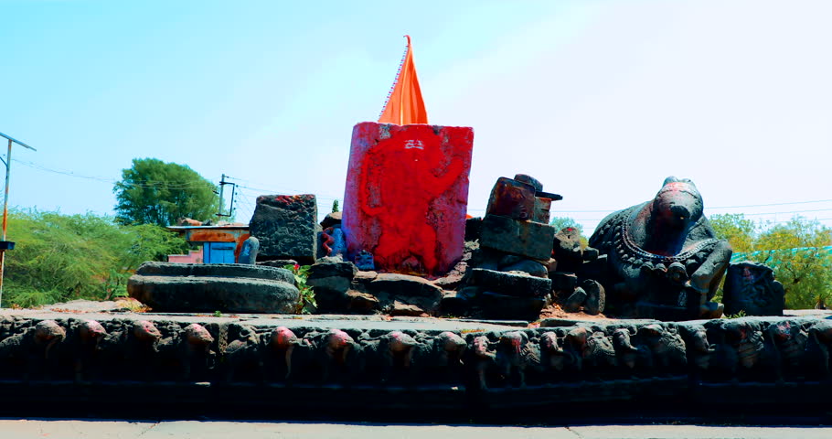 Mumbai India 10 April 2023,
Beautiful view of Monkey God statue Shri Hanuman Mandir and temple grounds on the road.

Hanuman statue with Orange Hindu flag,
Idol sculpture stone of Shri Hanuman Temple Royalty-Free Stock Footage #1105128099