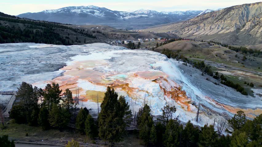 Mammoth Hot Springs, Yellowstone National Park. Aerial view from drone viewpoint in spring season. Drone aerial view of Canary Spring and terraces in the Mammoth Hot Spring area of Yellowstone Park
