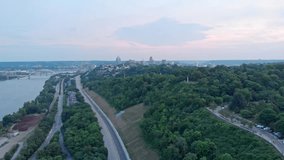 Downtown Cincinnati Skyline Distant Sunset Drone Video