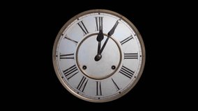 Old fashioned clock zoom vintage watch roman numerals spinning in dark black background timelapse