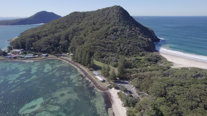 Tomaree Head Summit Walk And Marrungbanga Reserve In Shoal Bay, Australia. aerial sideways