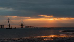 Bridge over the sea to Incheon Airport in Seoul, South Korea, 4k time lapse video watching sunset