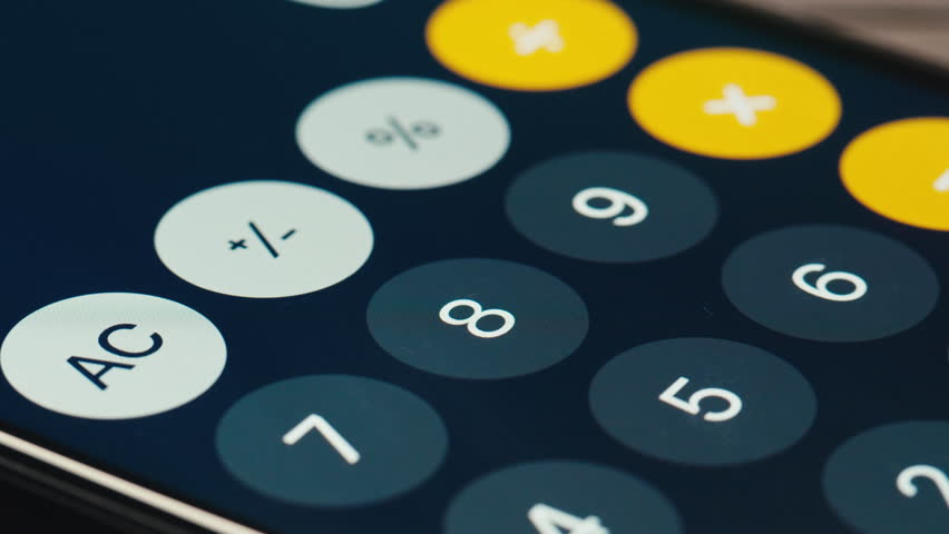 Man counts numbers on a calculator phone screen , smartphone, cell phone. Arithmetic, accounting, payroll, money. Add, subtract, multiply, divide. High quality studio shot close up, macro.  - Powered by Shutterstock - Get 15% off with code: PIKWIZARD15