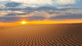 sandy desert at the dramatic sunset time lapse scene - Powered by Shutterstock - Get 15% off with code: PIKWIZARD15