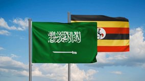 Republic of Uganda and Saudi Arabia flag waving together in the wind on blue sky, cycle looped video, two country cooperation concept