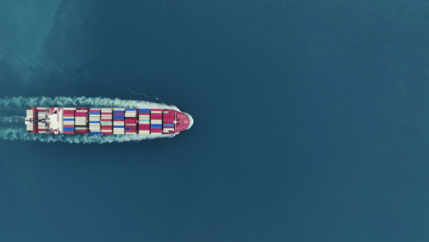 Cargo container Ship, cargo maritime ship with contrail in the ocean ship carrying container and running for export  concept technology freight shipping sea freight by Express Ship. top view  Royalty-Free Stock Footage #1105196583