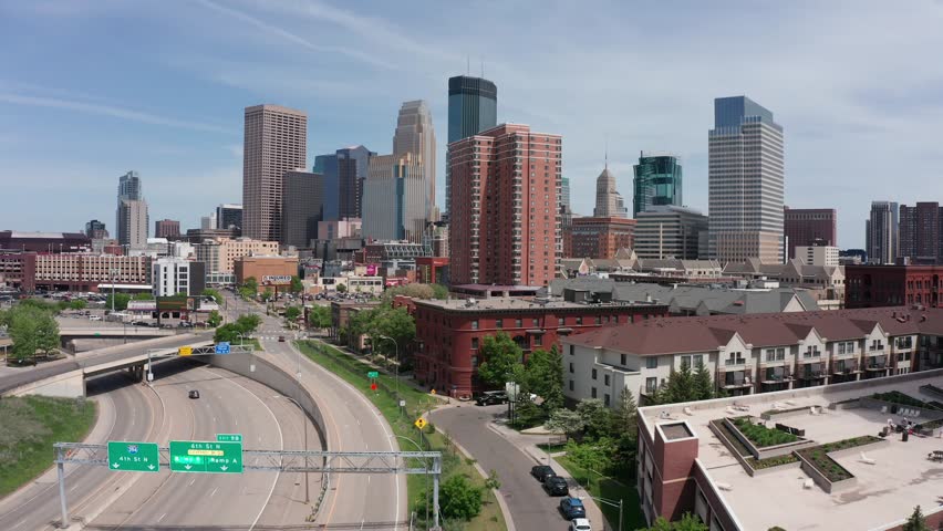 Rising aerial shot of downtown Minneapolis, Minnesota. 4K Royalty-Free Stock Footage #1105202723
