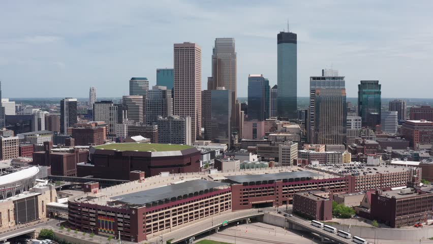 Close-up dolly aerial shot of the downtown Minneapolis skyline in Minnesota. 4K Royalty-Free Stock Footage #1105202725