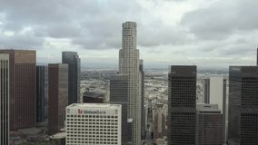 Stunning 4K aerial footage that weaves the viewer around and over the city skyline, revealing an epic, sweeping view of LA in a professionally produced, intricately staged manner.