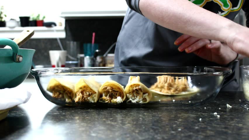 Rolling Enchiladas in Home Kitchen