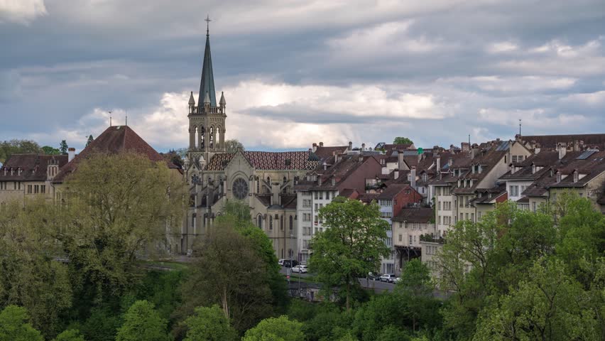 Bern (Berne) Switzerland time lapse 4K, city skyline timelapse at Bern old town with Church of St. Peter and St. Paul