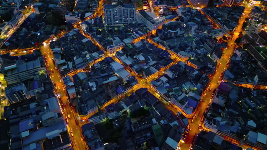 Aerial view of Bangkok Downtown skyline, highway roads or street in Thailand. Financial district and business area in smart urban city. Skyscraper and high-rise buildings at night.