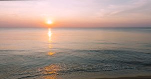 Aerial view Sea wave reflection sunset beach Phuket Thailand Sea Beach Sunset at sea Cinematic scene on beach view seascape beach and wave High quality video 4K DCI 4096x2160p. ProRes422