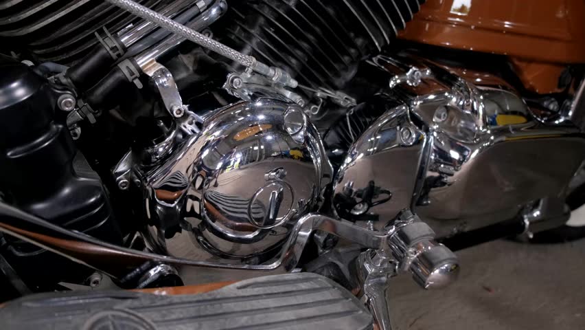 Close up of a beautiful chrome motorcycle engine. 