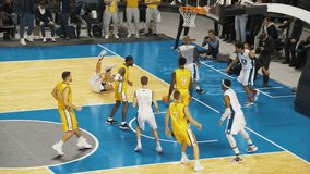 Basketball Championship Action on Live TV Channel Playback: Yellow Team Defense Player Steals the Ball From Opponent, Passes to a Forward Teammate Who Performs a Fast Effective Slam Dunk with One Hand - Powered by Shutterstock - Get 15% off with code: PIKWIZARD15